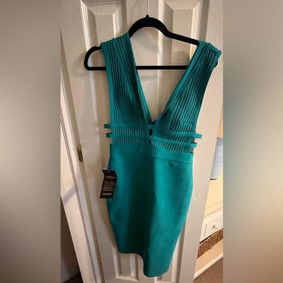 bebe Dresses & Skirts - Bebe plunge neck bandage dress